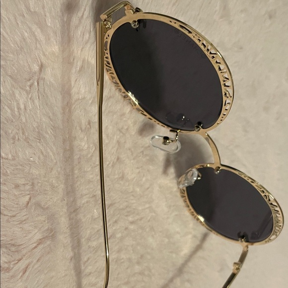 CHANEL Women\'s Sunglasses with Gold Frame and Black Lenses